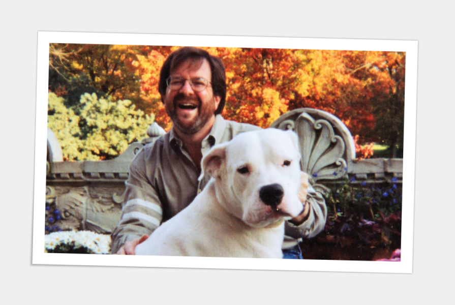A framed photo of Glen and his dog.