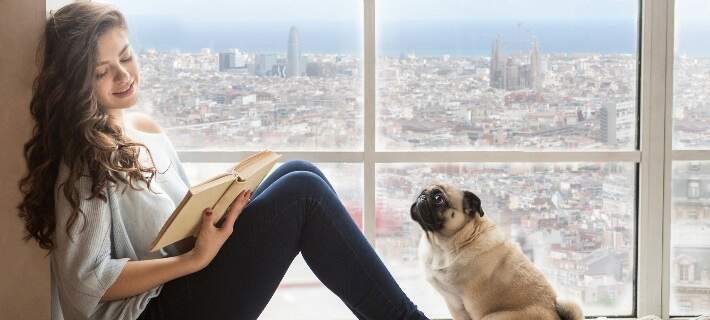 dog and woman in apartment